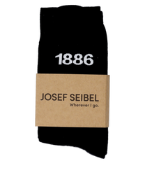 Schwarze Socken aus Baumwollmischung mit dezentem Pfeilmuster. Knöchellang und elastisch für bequemen Sitz. Schlichtes Design ohne sichtbare Nähte. Geeignet für Alltag und Beruf.