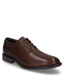 Der cognacfarbene Halbschuh besteht aus glänzendem Leder und verfügt über eine elegante Schnürung. Der Schuh hat eine klassische Form mit dezenten Nähten und einer robusten Sohle.