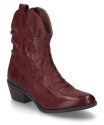La bota color burdeos está hecha de cuero suave y tiene una moderna cremallera en el costado. El zapato se caracteriza por su elegante tacón curvado y las costuras decorativas.