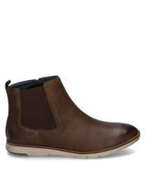Die Stiefelette besteht aus braunem Leder mit seitlichem Reißverschluss. Sie zeichnet sich durch eine helle Sohle und elastische Einsätze für zusätzlichen Komfort aus.