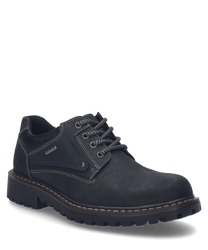 La scarpa nera in pelle presenta una robusta allacciatura e cuciture decorative a contrasto. La scarpa ha una suola resistente ideale per l'uso quotidiano.