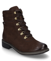 La botte est fabriquée en cuir marron et possède un système de laçage. Elle se distingue par des œillets robustes et un talon de hauteur moyenne idéal pour le quotidien.