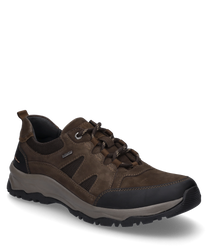 La chaussure basse en combinaison marron présente un design robuste avec des lacets et est fabriquée en cuir de haute qualité. Les caractéristiques particulières sont le renfort à l'avant du pied et la semelle profilée pour une meilleure adhérence.