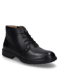Der Halbschuh ist aus schwarzem Leder gefertigt und verfügt über eine elegante Schnürung. Das schlichte Design wird durch dezente Ziernähte ergänzt die dem Schuh eine klassische Note verleihen.