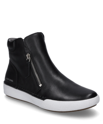 Zapatilla negra de cuero con cierre lateral de cremallera. Suela blanca y discreto logotipo en relieve en el talón.