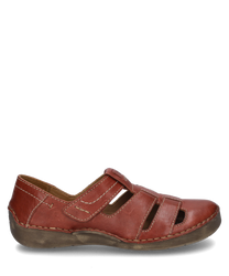 Chaussure demi-ouverte en cuir rouge avec fermeture velcro. Les particularités sont les coutures décoratives et les détails découpés qui assurent une bonne ventilation.