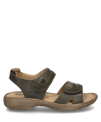 The sandal shown is moss green and features a practical Velcro closure. It is made of a high-quality soft material that provides comfort and flexibility.