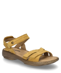 De sandaal is gemaakt van geel suede en heeft een praktische klittenbandsluiting. Het heeft een robuuste bruine zool en een minimalistisch ontwerp dat comfort en stijl verenigt.