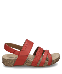 Sandale rouge avec fermeture velcro composée de cuir lisse et tressé. La semelle est en liège et offre un bon confort de port. Idéale pour l'été alliant style et fonctionnalité.