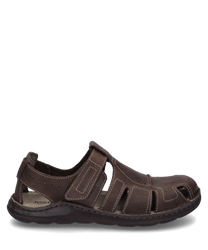 La sandalo color mocca è realizzato in pelle di alta qualità e ha una pratica chiusura in velcro. Si distingue per la sua struttura aperta e le delicate cuciture decorative che offrono ulteriore comfort e stile.