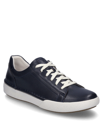 The sneaker in indigo color is made of smooth leather and features white laces. The sole is made of durable white rubber giving the shoe a modern look.