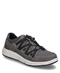 Gray lace-up shoe made of leather and textile material. The shoe features black diagonal stripes and a white sole that provides comfort.