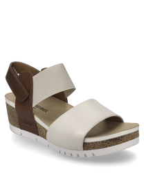 Beige sandal with Velcro closure made of a beige textile and a brown leather strap. The sandal features a comfortable cork sole with white profiling and offers a modern casual look.
