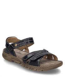 Die Sandale hat ein Obermaterial aus dunkelbraunem Leder mit kontrastierenden weißen Nähten. Sie verfügt über einen praktischen Klettverschluss und eine robuste beige Sohle mit Profil für optimalen Halt.