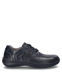 The shoe is made of black leather and features lacing. The seam details and smooth finish give the shoe an elegant look.