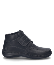 Black leather ankle boot with Velcro closure ideal for a comfortable fit. The shoe features a simple design and durable material.