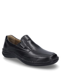 The black slip-on is made of smooth leather and features a practical elastic band as a closure. The shoe is characterized by its simple design and comfortable fit.