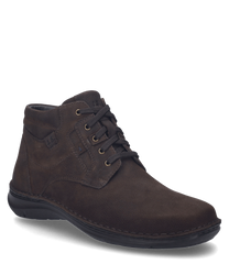 El zapato en color Moro está hecho de cuero de alta calidad y cuenta con un sistema de cordones para un ajuste óptimo. La estructura discreta del material y la sólida confección le otorgan al zapato un aspecto elegante y atemporal.