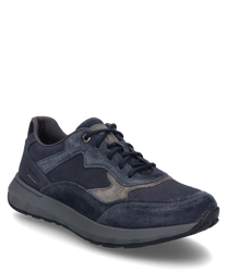 Ce sneaker de couleur Ocean-Kombi est fabriqué en cuir de haute qualité et en daim avec un laçage solide comme fermeture. Les teintes bleu marine et grises lui confèrent un look élégant idéal pour des tenues décontractées et stylées.