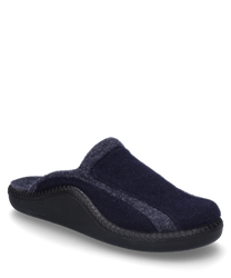 The house slipper in the color "ocean-combi" features a soft textile upper in dark blue with gray accents. It has no closure and a sturdy black sole for added comfort.