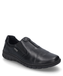 La chaussure noire est en cuir lisse et se distingue par une fermeture élastique pratique. La semelle robuste offre un maintien et un confort optimaux.