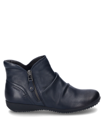 La botte en couleur Océan se distingue par son design en cuir lisse et élégant avec une fermeture éclair latérale. La chaussure offre un aspect légèrement froncé qui lui confère une touche moderne.