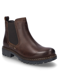 La bota en color Moro está hecha de cuero de alta calidad y cuenta con un elástico de goma para facilitar el calzado. El zapato tiene una suela de perfil robusto y es ideal para el uso diario.