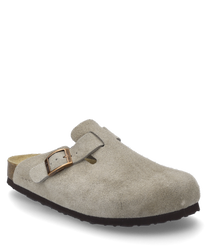 De taupe kleurige clog is gemaakt van suede en heeft een decoratieve gesp als sluiting. Het lichtbruine licht gestructureerde oppervlak geeft de schoen een klassieke uitstraling.