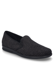 A black house slipper with a woven pattern and elastic closure. The shoe is made of a soft flexible material and provides a comfortable fit.