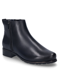 Dark blue ankle boot made of shiny material with a side zipper. The shoe has a flat heel and a smooth surface.
