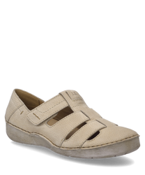 Chaussure demi-saison beige en cuir avec fermeture velcro. La chaussure a des parties ouvertes pour la respirabilité et une surface texturée.
