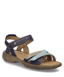 Deze indigo-multi sandaal heeft een praktische klittenbandsluiting en is gemaakt van duurzaam materiaal. De kleurcombinatie van blauw en beige geeft het een modieuze uitstraling.