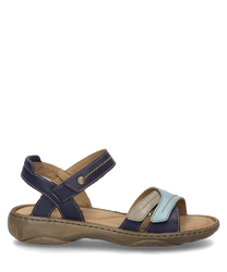 Deze indigo-multi sandaal heeft een praktische klittenbandsluiting en is gemaakt van duurzaam materiaal. De kleurcombinatie van blauw en beige geeft het een modieuze uitstraling.