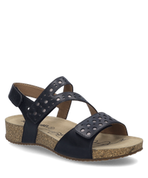 Questa sandalo nera è dotata di una comoda chiusura in velcro e di una suola imbottita in materiale di sughero marrone chiaro. La scarpa ha un design moderno con aperture rotonde e offre sia stile che comfort.