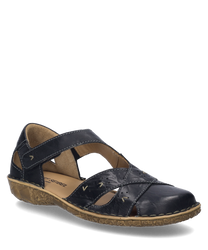 La sandalia negra está hecha de cuero de alta calidad con un cómodo cierre de velcro. El zapato presenta un patrón floral en la suela y costuras decorativas sutiles que le dan al diseño elegancia.