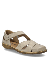 La sandaletta color crema è dotata di una comoda chiusura in velcro e presenta delicate perforazioni decorative sulla tomaia. La suola ha un leggero motivo floreale strutturato che conferisce alla sandaletta un fascino particolare.