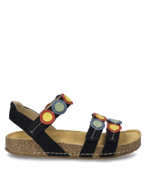 This black sandal features a comfortable cork footbed and a Velcro strap for easy on and off. Eye-catching colorful circles adorn the straps giving the shoe a playful look.