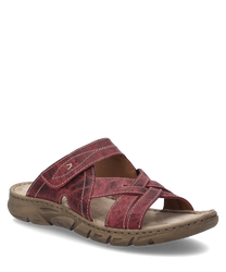 The sandal in the color orchid is made of a durable material with visible seams. It features a practical Velcro closure and a textured sole for better grip.