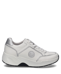 This sneaker features a stylish combination of white and silver with a lace-up closure for a customized fit. The shoe stands out with its smooth material and distinctive logo detail on the side.