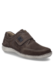 Der Halbschuh in der Farbe Espresso besteht aus hochwertigem Leder und verfügt über einen praktischen Klettverschluss. Der Schuh zeichnet sich durch sein schlichtes Design und die robuste Sohle aus ideal für den täglichen Gebrauch.