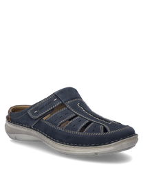 La scarpa mezza alta blu scuro in pelle è dotata di una pratica chiusura in velcro. Caratteristiche particolari sono le cuciture decorative e la suola chiara e comoda.