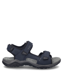 La sandale représentée en couleur indigo est fabriquée à partir d'un matériau robuste et dispose d'une fermeture velcro pratique. Le design se caractérise par une semelle confortable et des sangles renforcées qui offrent un maintien optimal.