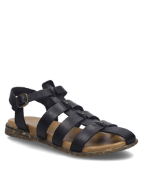 La sandale noire est dotée d'une fermeture à boucle et est fabriquée dans un matériau lisse. La chaussure a une semelle plate et naturelle qui assure le confort.