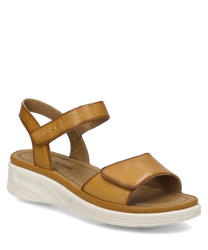 De sandaal in de kleur Amber heeft een comfortabele klittenbandsluiting en is gemaakt van hoogwaardig materiaal. Het heeft een minimalistisch ontwerp met een platte witte zool.