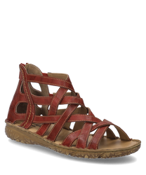 The sandal shown is red and made of leather. It features a practical zipper on the side and has a sturdy beige sole.