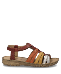 La sandale en rouge-multi présente un design coloré en cuir dans les couleurs rouge orange jaune et argent. Elle dispose d'une fermeture velcro confortable et d'une semelle robuste et structurée.