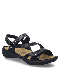 La sandale noire est fabriquée en matériau lisse et dispose d'une fermeture velcro pratique. Elle est ornée de clous décoratifs qui donnent à la chaussure un look moderne.