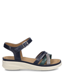 La sandalia en azul oscuro-múltiple presenta un diseño elegante con un cierre de velcro en el tobillo. Está hecha de material de alta calidad con varias correas de colores y una cómoda suela clara.