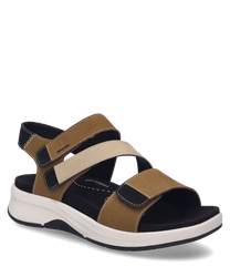 The sandal in the color Castagne-combination is made of a material mix and features a practical Velcro closure. The shoe has a white sole and contrasting black details for a sporty look.