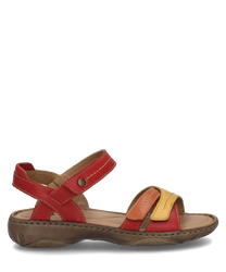 This sandal in ruby-multi showcases a vibrant spectrum of colors with red yellow and brown leather straps. It features a practical Velcro closure and a comfortable cushioned sole.